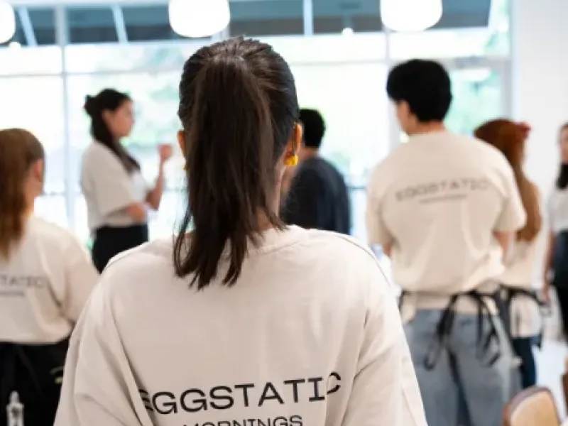 Eggstatic servers in Mornings tees lined up in the dining area