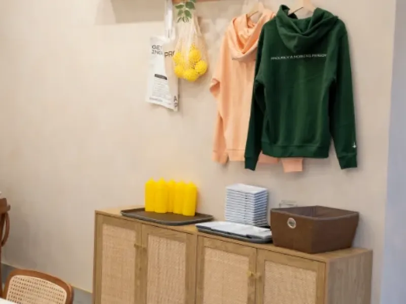 Eggstatic "Proudly a Morning Person" hoodies and morning-person merch shelf at Eggstatic Oakville