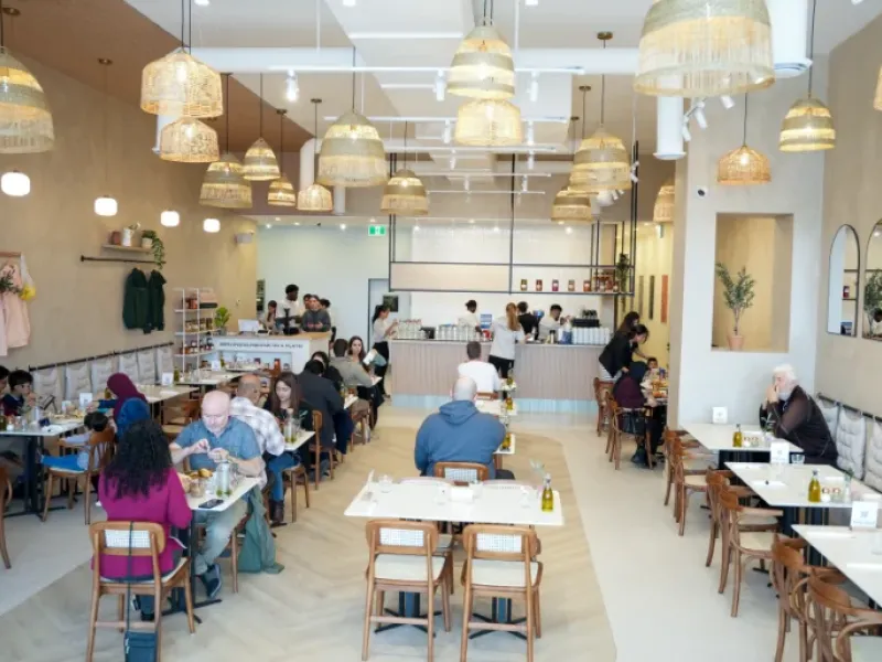 Eggstatic Waterdown busy brunch service with rattan pendants and full dining room