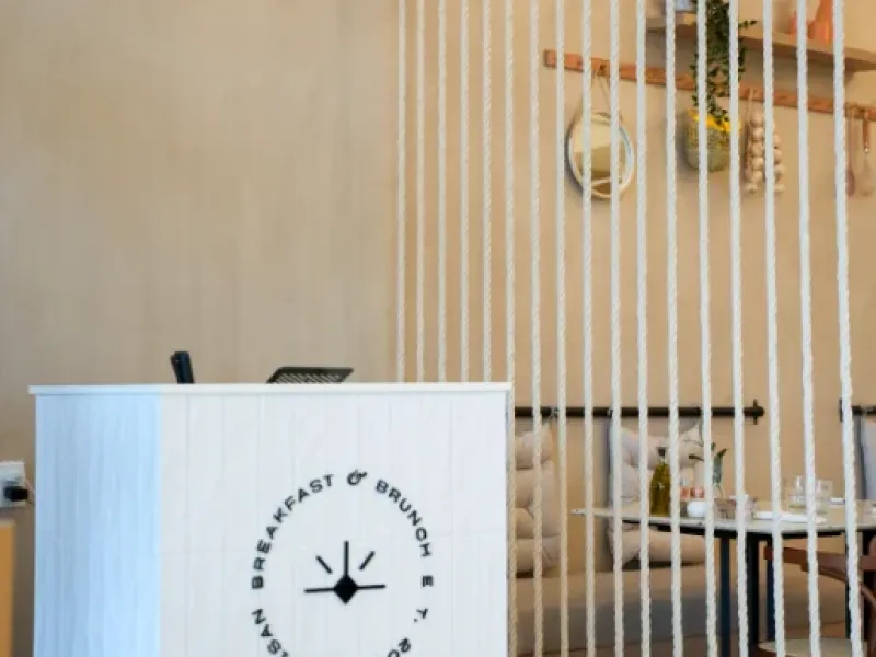 Eggstatic Waterdown host stand and rope curtain entrance near the dining area